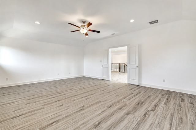 empty room featuring ceiling fan and light hardwood / wood-style floors