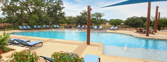 view of swimming pool featuring a patio