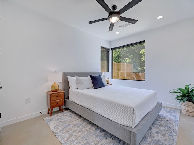 bedroom with light colored carpet and ceiling fan