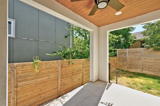 view of patio featuring ceiling fan