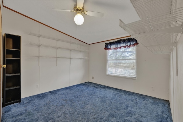 unfurnished room with carpet flooring, ceiling fan, and lofted ceiling