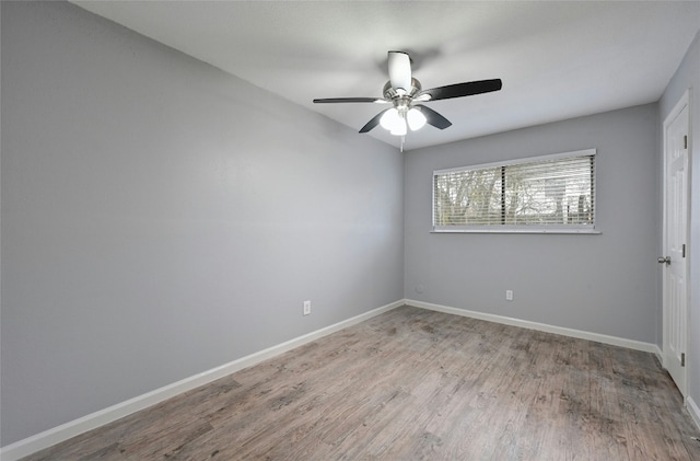 spare room featuring ceiling fan and light hardwood / wood-style floors