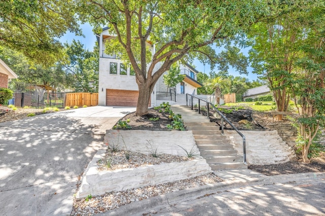 view of front of property featuring a garage