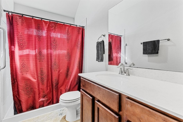 bathroom with tile patterned floors, curtained shower, vanity, and toilet