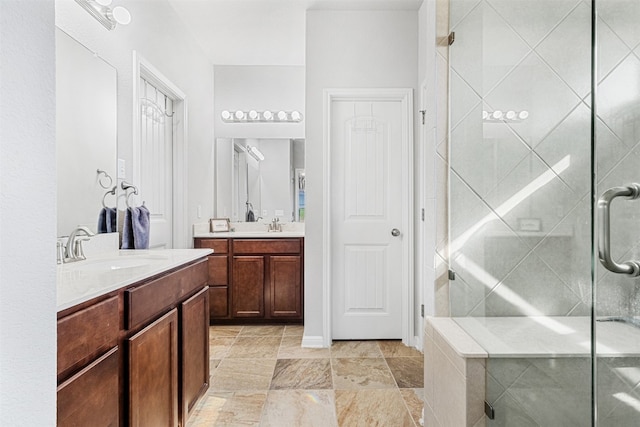 bathroom with vanity and an enclosed shower