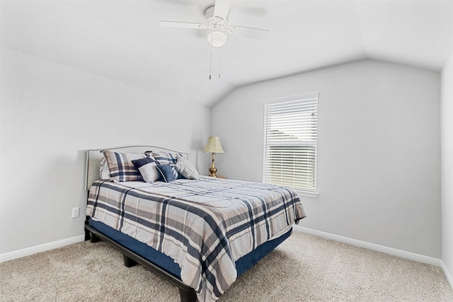 bedroom with carpet, ceiling fan, and lofted ceiling