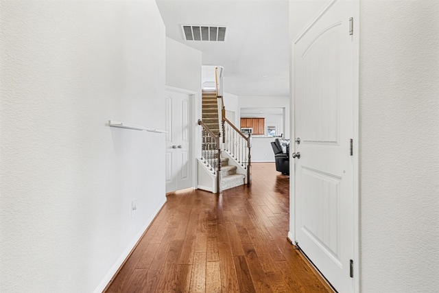 hall featuring wood-type flooring