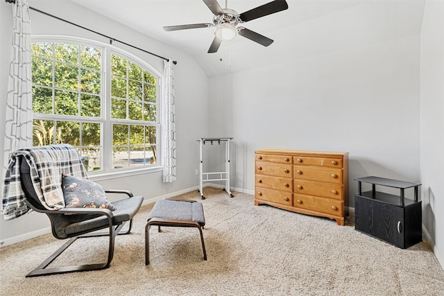 sitting room featuring carpet flooring, ceiling fan, and vaulted ceiling