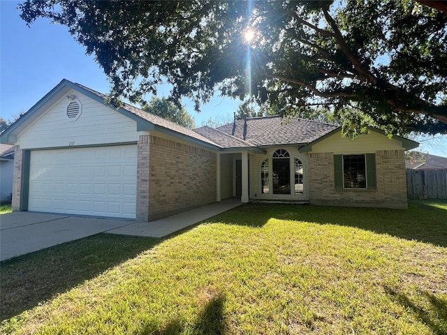 single story home with a garage and a front yard