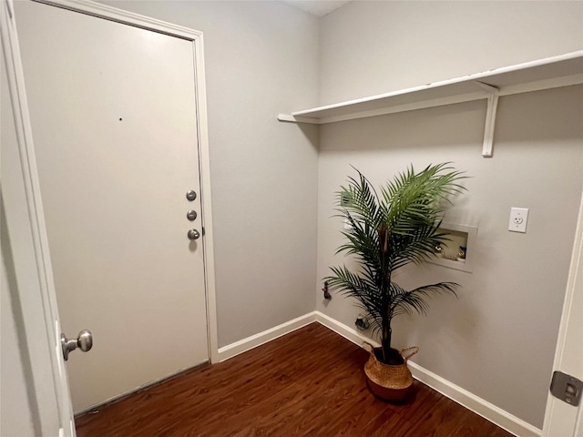 laundry room with washer hookup and hardwood / wood-style floors