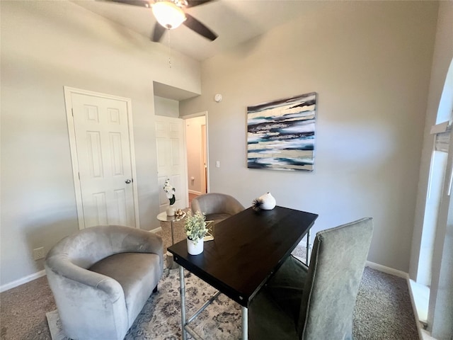 carpeted home office with ceiling fan