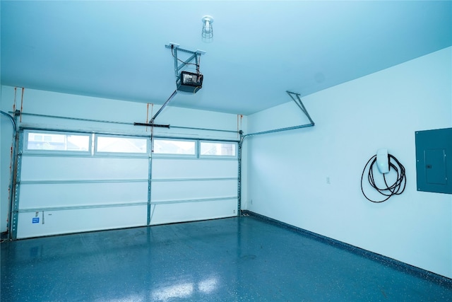 garage featuring electric panel and a garage door opener