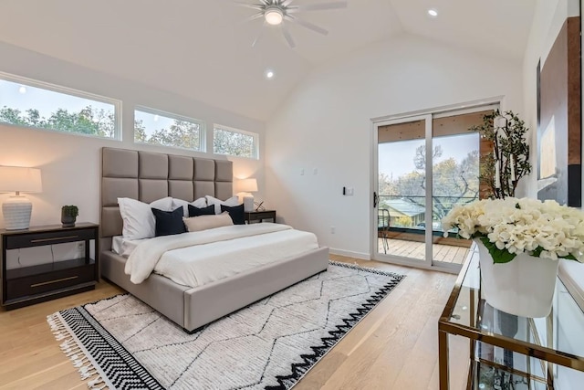 bedroom with light hardwood / wood-style flooring, access to outside, high vaulted ceiling, and ceiling fan