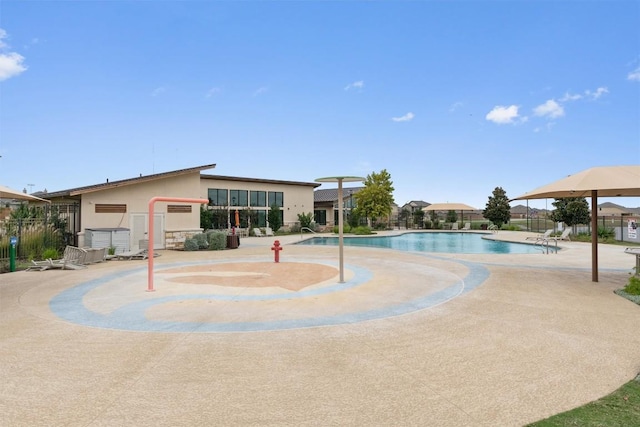 view of swimming pool featuring a patio