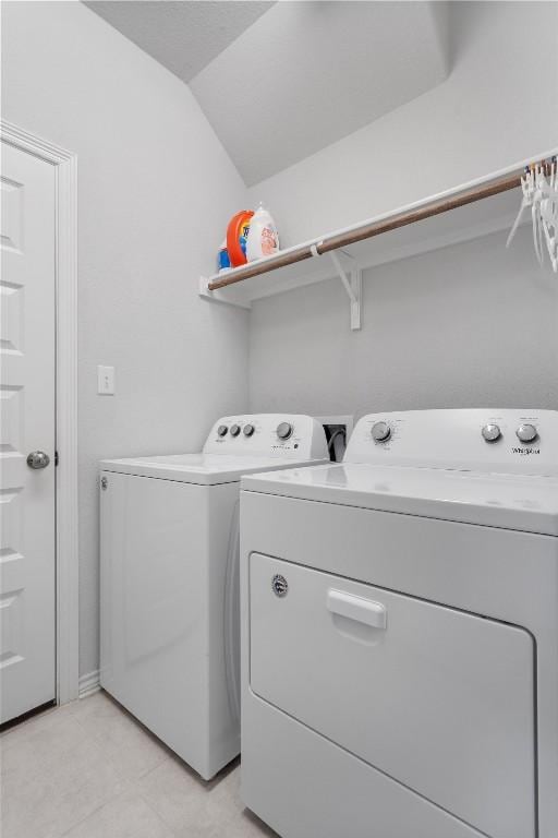 washroom with separate washer and dryer