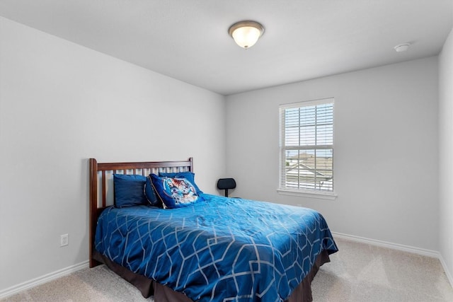 bedroom featuring carpet