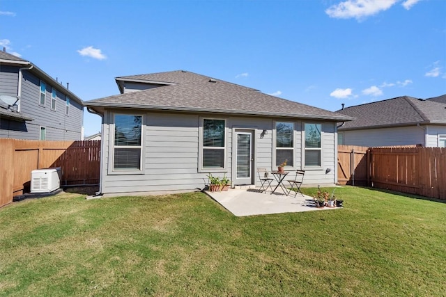 back of property featuring a yard and a patio