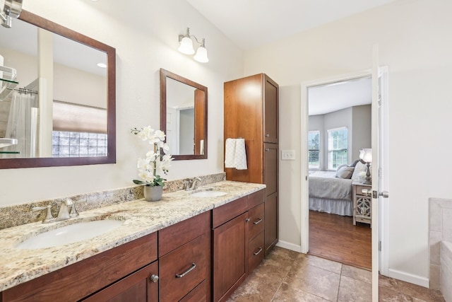 bathroom featuring vanity and wood-type flooring