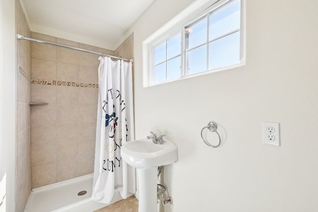 bathroom with a shower with curtain