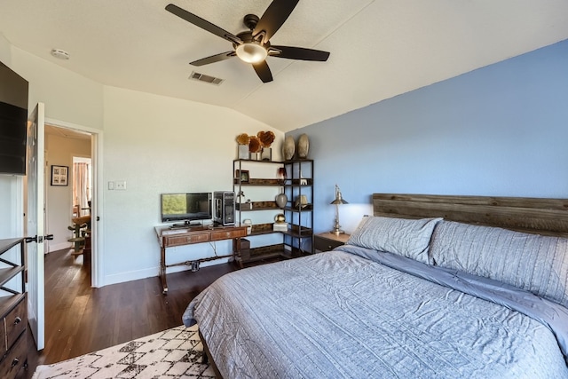 bedroom featuring ceiling fan, dark wood-type flooring, and vaulted ceiling