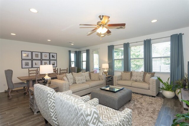 living room featuring hardwood / wood-style floors, plenty of natural light, and ceiling fan