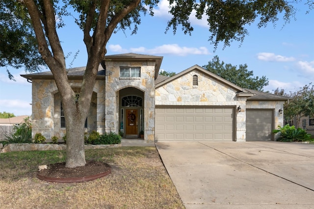 view of front of property featuring a garage