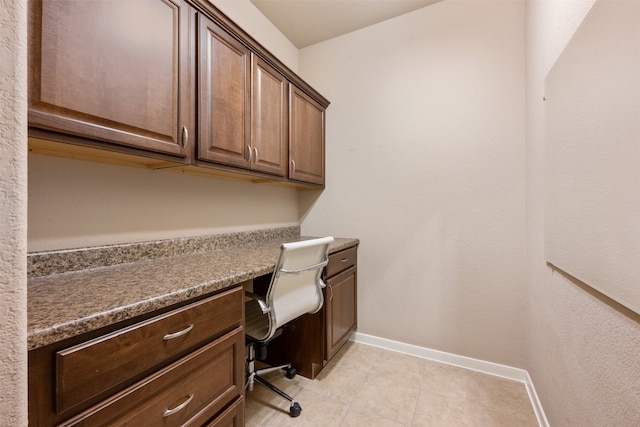 tiled home office with built in desk