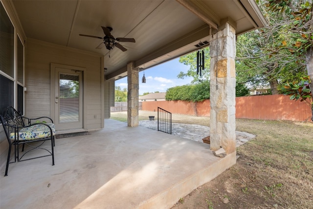 view of patio featuring ceiling fan