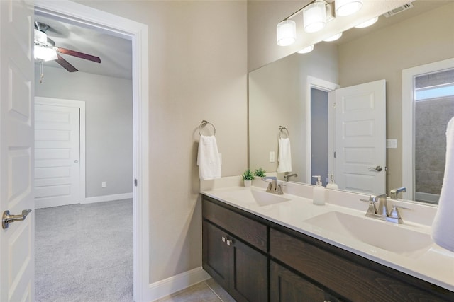 bathroom featuring vanity and ceiling fan