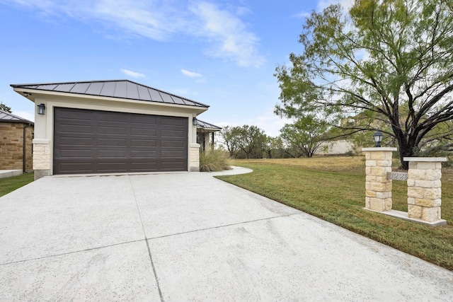 garage with a yard