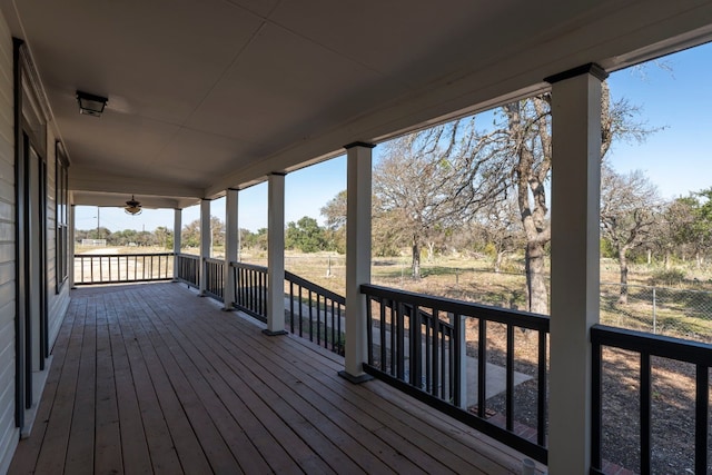 wooden terrace with ceiling fan