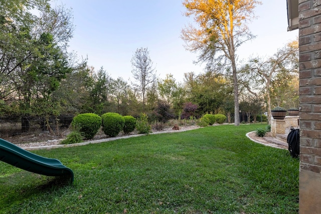 view of yard featuring a playground