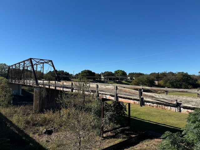 view of yard with a rural view