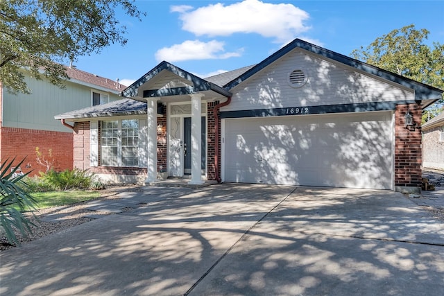 view of front of home with a garage