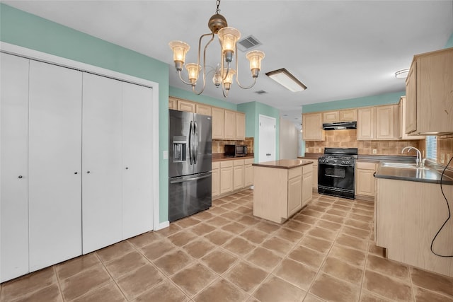 kitchen featuring decorative backsplash, gas stove, pendant lighting, fridge with ice dispenser, and a center island