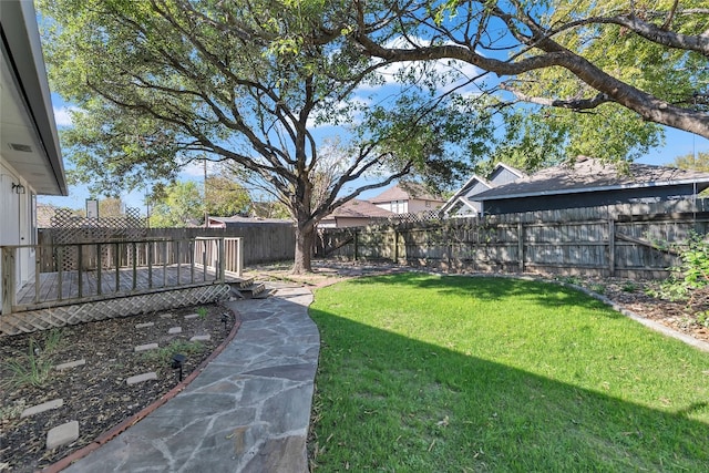 view of yard featuring a deck