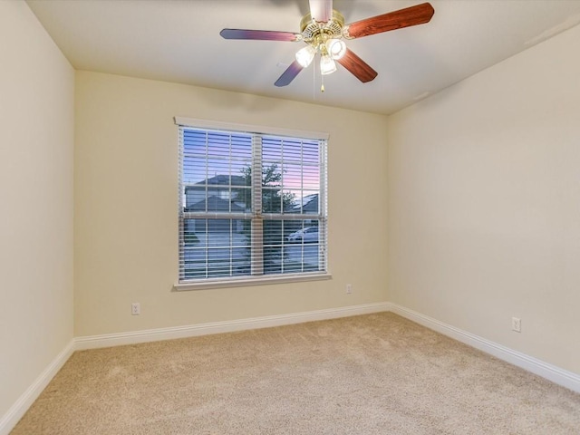 8061 Massa Dr, Round Rock, TX 78665 - unfurnished room featuring carpet, baseboards, and a ceiling fan