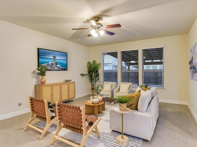 living room featuring ceiling fan