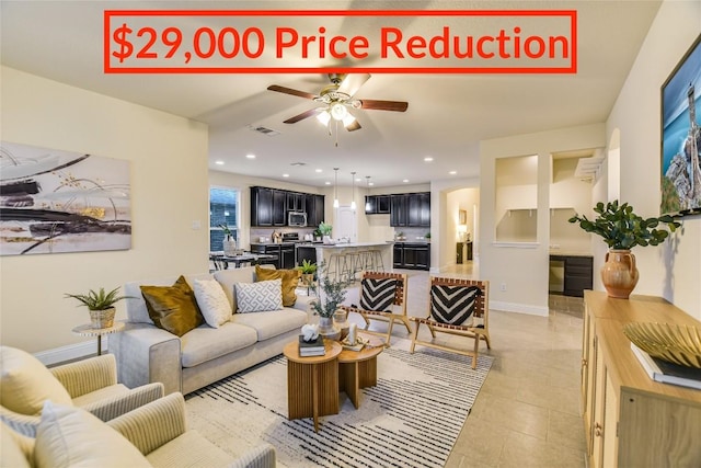 8061 Massa Dr, Round Rock, TX 78665 - living room featuring a ceiling fan and light tile patterned floors