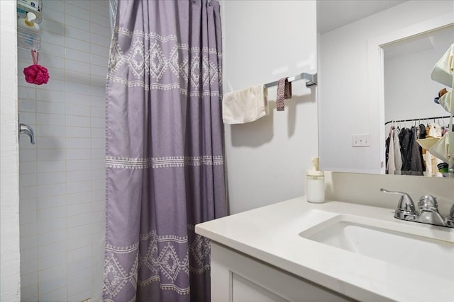 bathroom featuring vanity and walk in shower