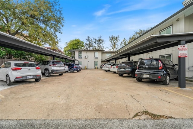 view of vehicle parking featuring a carport