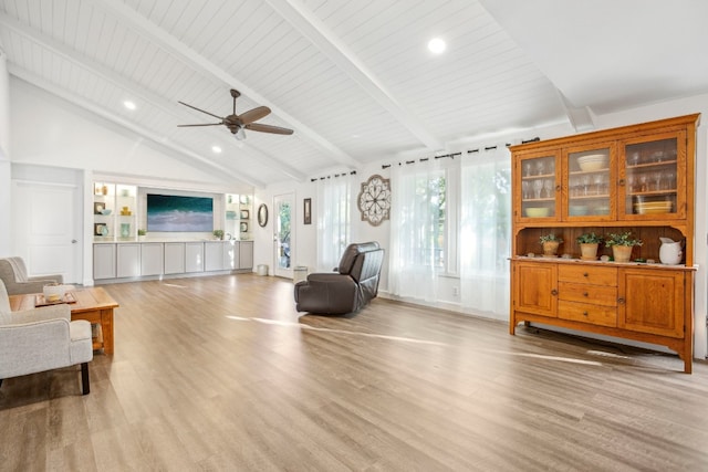 living room with wooden ceiling, high vaulted ceiling, light hardwood / wood-style flooring, ceiling fan, and beam ceiling