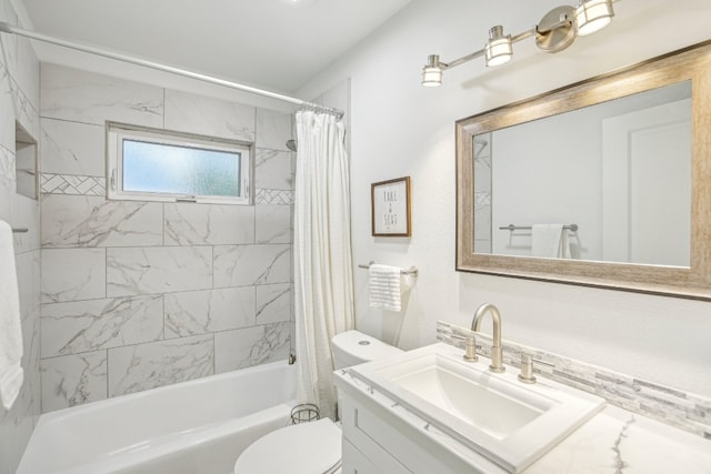 full bathroom with vanity, toilet, and shower / bath combo