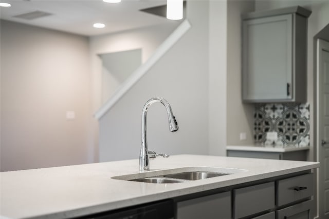 kitchen with gray cabinets and sink