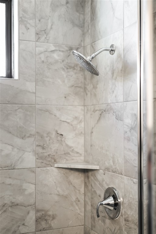 room details with a tile shower