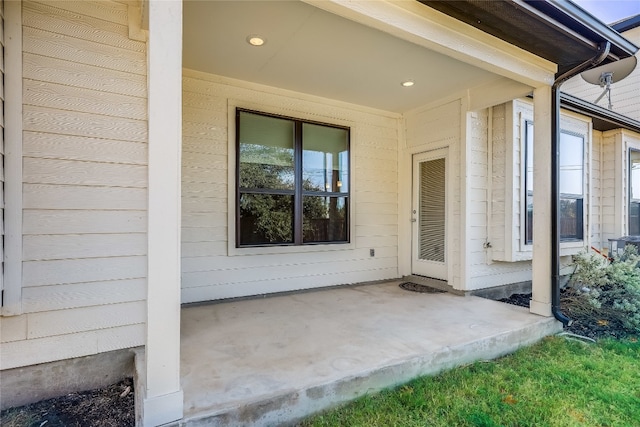 doorway to property featuring a patio