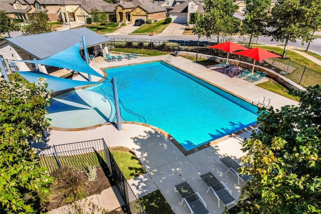 view of pool featuring a patio area