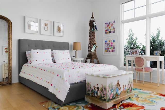 bedroom featuring hardwood / wood-style floors