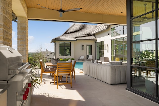 view of patio / terrace with ceiling fan