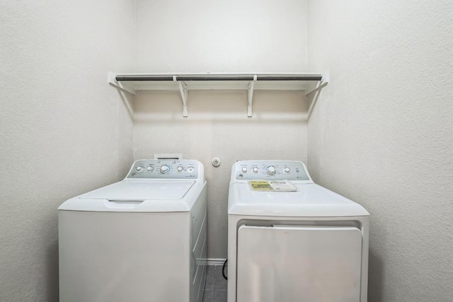 washroom featuring independent washer and dryer